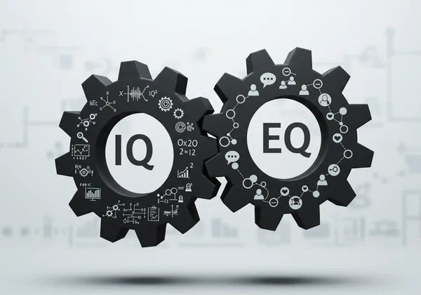 Interlocking gears symbolizing EQ and IQ working in synergy.