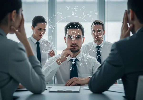 Smart person struggling with social interaction in a team setting.