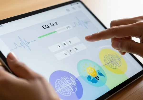 Person interacting with an online EQ test interface for clarity.